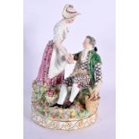 A 19TH CENTURY MEISSEN PORCELAIN FIGURAL GROUP depicting a gallant and female amongst foliage. 22 cm