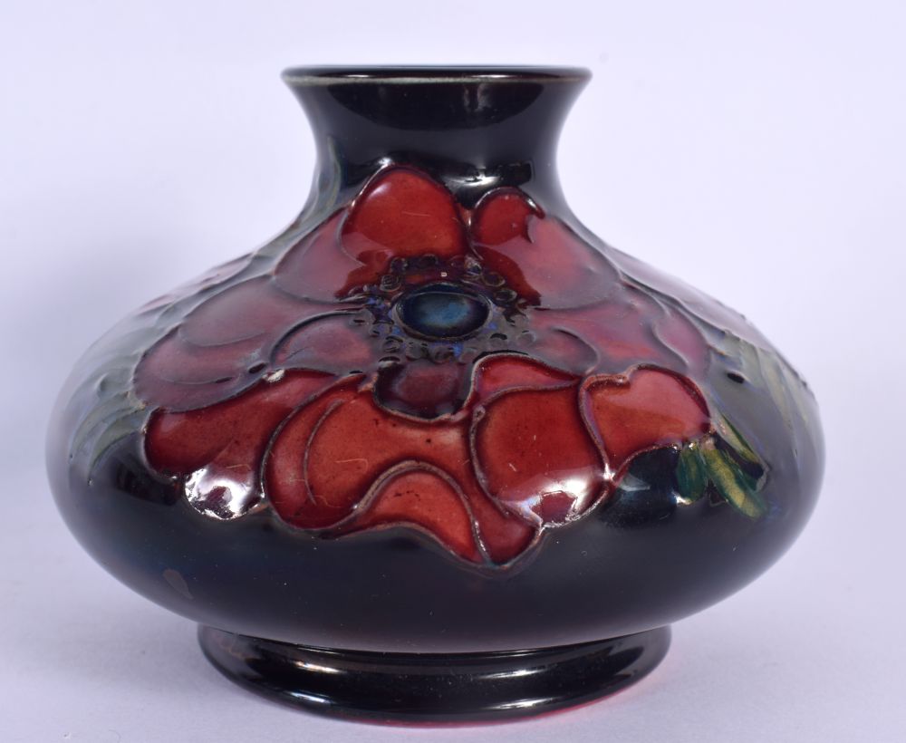 A MOORCROFT SQUAT VASE. 10 cm wide.