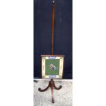 An antique wooden fire screen embroidered with a kingfisher 130 x 30cm