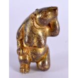A CHINESE QING DYNASTY GILT BRONZE SCROLL WEIGHT formed as a standing bear. 7 cm x 3.5 cm.