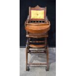 A 19th Century Metamorphic child's chair with upholstered back and metal wheels 95 x 35 x 53 cm