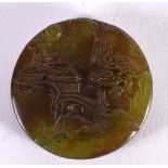 A CHINESE JADE PLAQUE 20th Century. 5 cm wide.