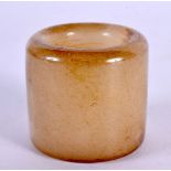 A CHINESE CARVED JADE ARCHERS RING 20th Century. 3.5 cm wide.