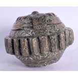 A 19TH CENTURY MIDDLE EASTERN COPPER ALLOY BETEL LIME BOX possibly Bhutan. 10 cm wide.