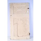 An early carved wooden panel 94 x 49 cm