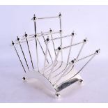 A SILVER PLATED DRESSER STYLE TOAST RACK. 22 cm x 17 cm.