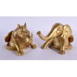 A PAIR OF CONTINENTAL BRONZE RHINOCEROS AND ELEPHANT PAPERWEIGHTS. 17 cm x 5 cm.