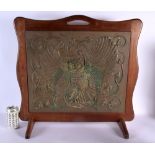 A RARE ARTS AND CRAFTS EMBOSSED OWL FIRE SCREEN decorated amongst vines. 60 cm x 55 cm.