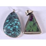 TWO CONTINENTAL SILVER AND TURQUOISE PENDANTS. Stamped 925, Largest 5.2cm x 3.1cm, weight 34.3g (2