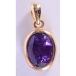 AN 18CT GOLD AND AMETHYST PENDANT. 2.9 grams. 1.75 cm x 0.75 cm.