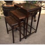 A NEST OF THREE 19TH CENTURY CHINESE HARDWOOD TABLES. Largest 70 cm x 47 cm. (3)