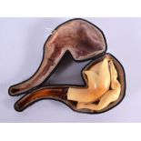 A LARGE ANTIQUE MEERSCHAUM AND AMBER EROTIC PIPE. 20 cm x 10 cm.