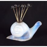 A RARE ART DECO FRENCH GLASS FIGURE OF A SNAIL Attributed to Sabino, with six escargot picks. Snail