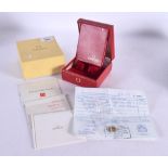 OMEGA WATCH BOX WITH PAPERS & A LADIES OMEGA WATCH MOVEMENT. Serial No 28583537. Movement 1.5cm in