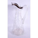 AN ANTIQUE FRENCH SILVER MOUNTED CLASS CLARET JUG. 29 cm high.