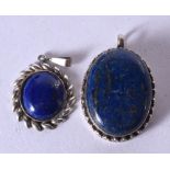 TWO CONTINENTAL SILVER AND LAPIS PENDANTS. Stamped 925, largest 4.1cm x 2.8cm x 1.2cm, total weight