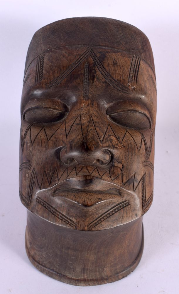 A TRIBAL CARVED AFRICAN SCARIFIED BUST OF A MALE. 21 cm x 11 cm.