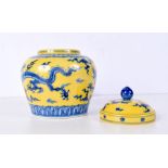 A Chinese porcelain Imperial yellow ginger jar and cover decorated with a dragon 17 cm