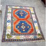 A Turkish wool rug 250 x 185 cm