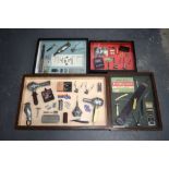 A LOVELY SET OF FOUR 1950S BARBERS SHOP RAZOR DISPLAY CASES in various forms and sizes. Largest 80 c