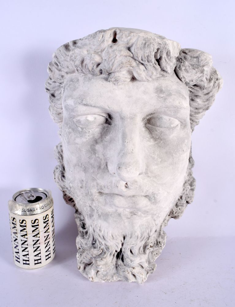 A LARGE CONTINENTAL CARVED PLASTER HEAD After the Antiquity. 37 cm x 27 cm.