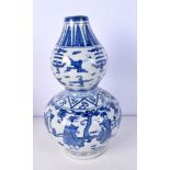 A Chinese porcelain blue and white Double Gourd vase decorated with figures 36 cm.