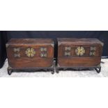 A pair of small wooden Korean cabinets on stands 40 x 55 x 24 cm.