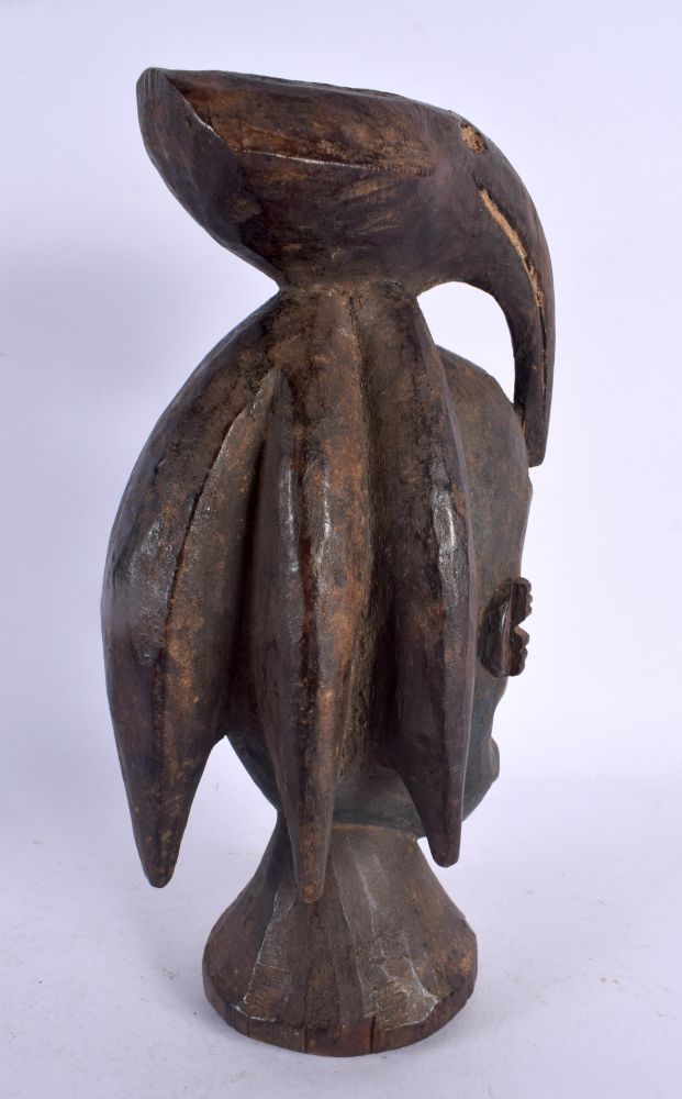 AN AFRICAN TRIBAL CARVED BIRD OVERLAID MASK. 27 cm high. - Image 3 of 4
