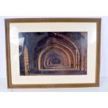 A FRAMED PASTEL by G Loukumski, depicting an interior. 34 cm x 53 cm.