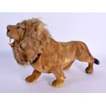 A 1950S ENGLISH NOVELTY NODDING LION TOY. 30 cm x 17 cm.