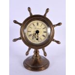 A CONTEMPORARY SHIPS WHEEL CLOCK. 16 cm x 11 cm.