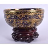 A LATE 19TH CENTURY JAPANESE MEIJI PERIOD SATSUMA BOWL painted with immortals. 12 cm diameter.