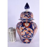 A 19TH CENTURY JAPANESE MEIJI PERIOD IMARI VASE AND COVER. 32 cm x 15 cm.