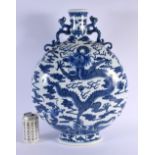 A LARGE CHINESE TWIN HANDLED BLUE AND WHITE PORCELAIN MOON FLASK 20th Century, painted with dragons.