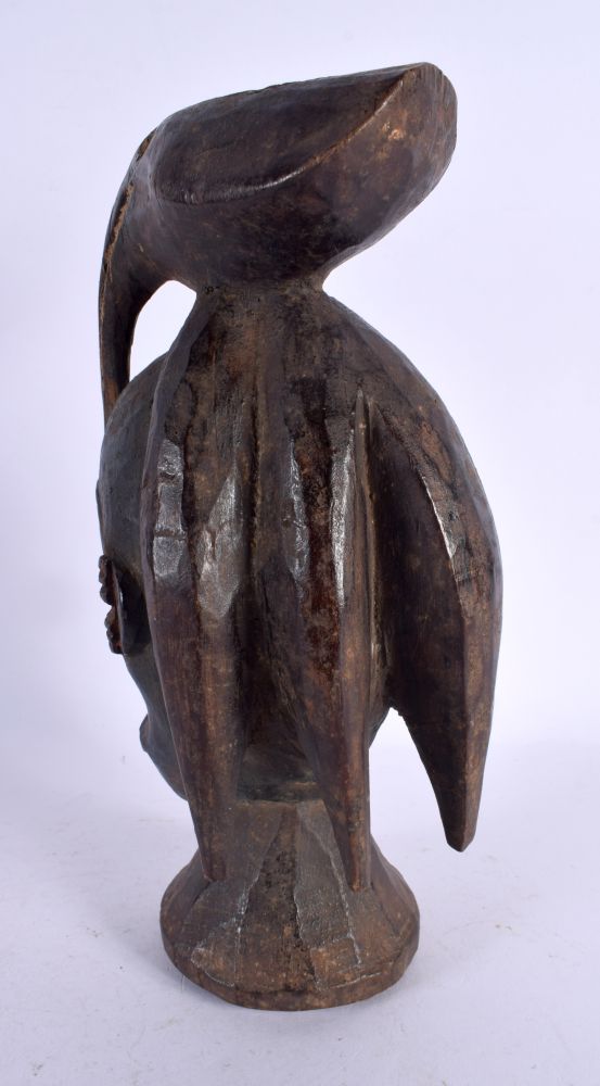 AN AFRICAN TRIBAL CARVED BIRD OVERLAID MASK. 27 cm high. - Image 2 of 4