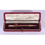 A CASED 9CT GOLD PENCIL. 7.4 grams. 7.5 cm long.