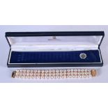 A CASED 9K GOLD TRIPLE STRAND PEARL BRACELET. Stamped 9K, 19cm x 2.3cm, weight 45g