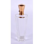 AN 18CT GOLD CRYSTAL GLASS SCENT BOTTLE. 9 cm x 3 cm.