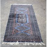 A Persian rug 180 x 94 cm