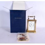 A BOXED TAYLOR & BLIGH CARRIAGE CLOCK. 17 cm high inc handle.