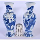 A PAIR OF 19TH CENTURY CHINESE BLUE AND WHITE PORCELAIN VASES bearing Kangxi marks to base. 31 cm hi