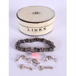 A LINKS OF LONDON SILVER BRACELET with charms. 89.5 grams. 5 cm wide.