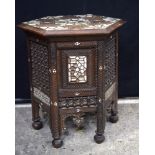 A small Liberty's style hexagonal inlaid Moorish table 54 x 50cm