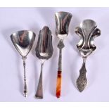 THREE SILVER CADDY SPOONS. 48 grams. Largest 13 cm x 2.75 cm. (3)