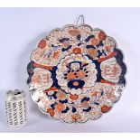 A 19TH CENTURY JAPANESE MEIJI PERIOD IMARI CHARGER painted with foliage. 30 cm diameter.