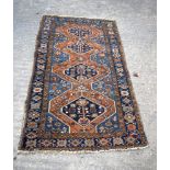 A Turkish Tribal rug 180 x 97 cm.