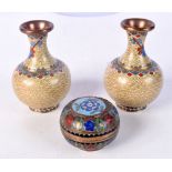 A pair of Chinese Cloisonne enamel vases together with a small Cloisonne lidded cosmetic pot