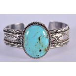 NATIVE AMERICAN SILVER AND TURQUOISE BANGLE. Stamped Sterling, 6.1cm x 4.6cm, weight 71.3g