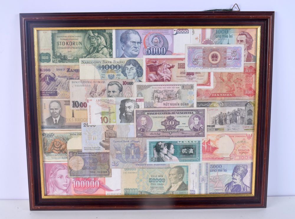 A FRAMED GROUP OF CURRENCY BANK NOTES. 48 cm x 38 cm.