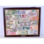 A FRAMED GROUP OF CURRENCY BANK NOTES. 48 cm x 38 cm.
